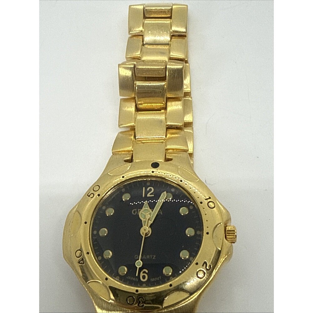 Geneva Women’s Watch Black Dials Gold Bezel Gold Bracelet